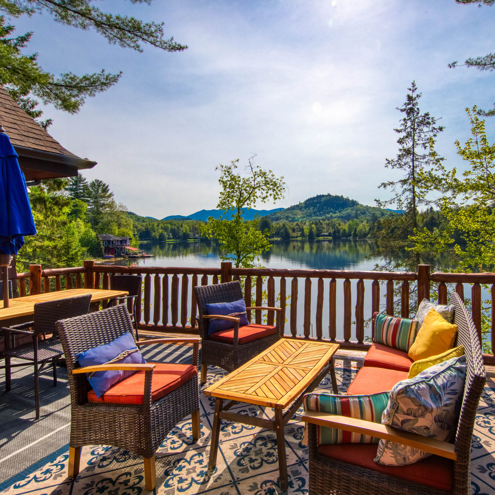 Camp Sonshine with a bright exterior view on the deck with views of Mirror Lake